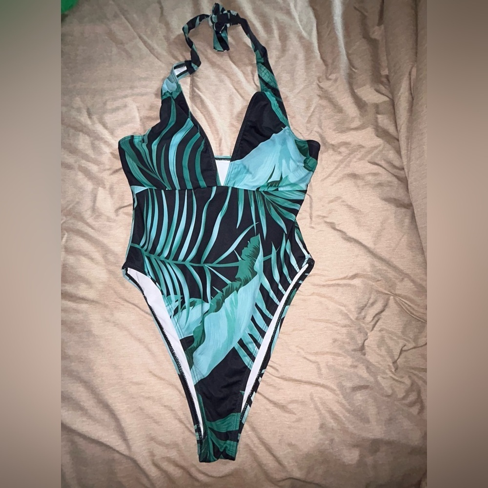 NWOT women’s deep neck plunge one piece swimsuit